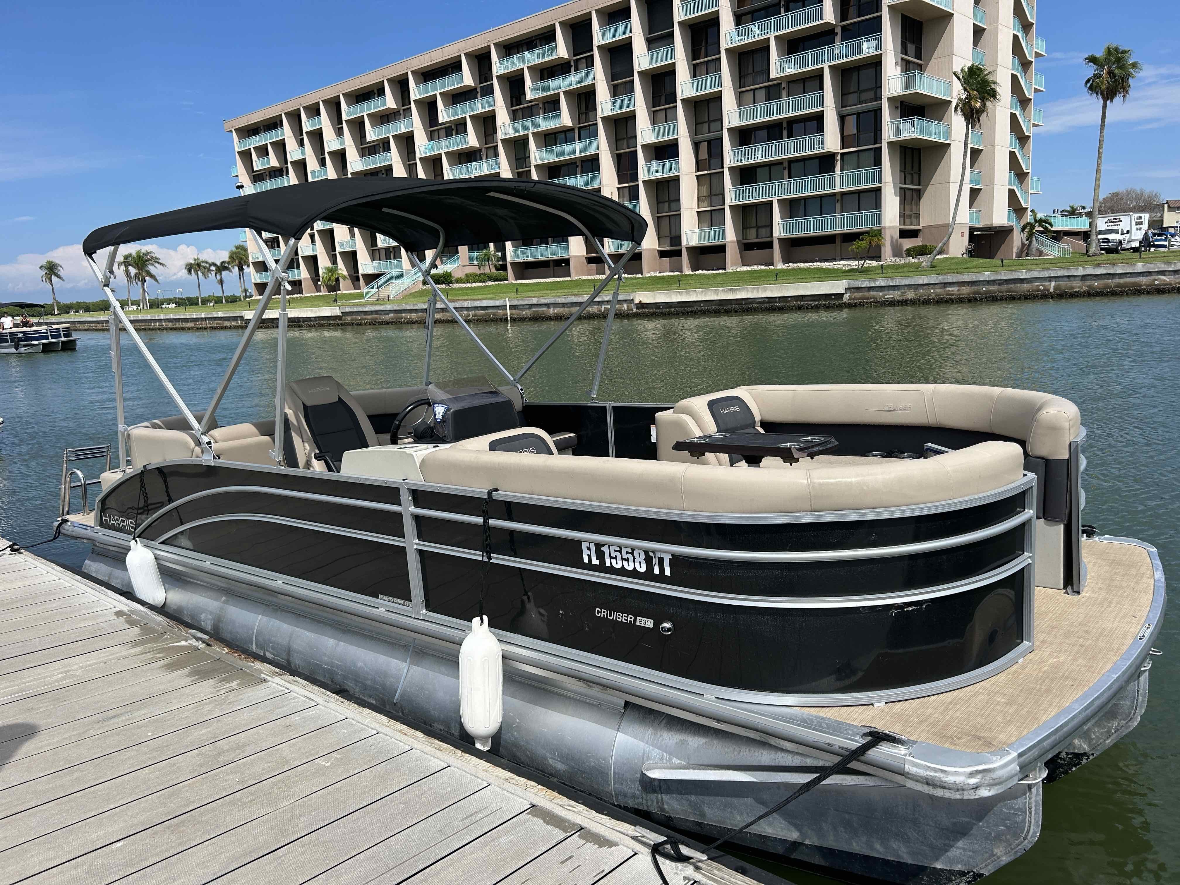 WITH PORPUSE - 23’ Harris Tritoon (150 HP)