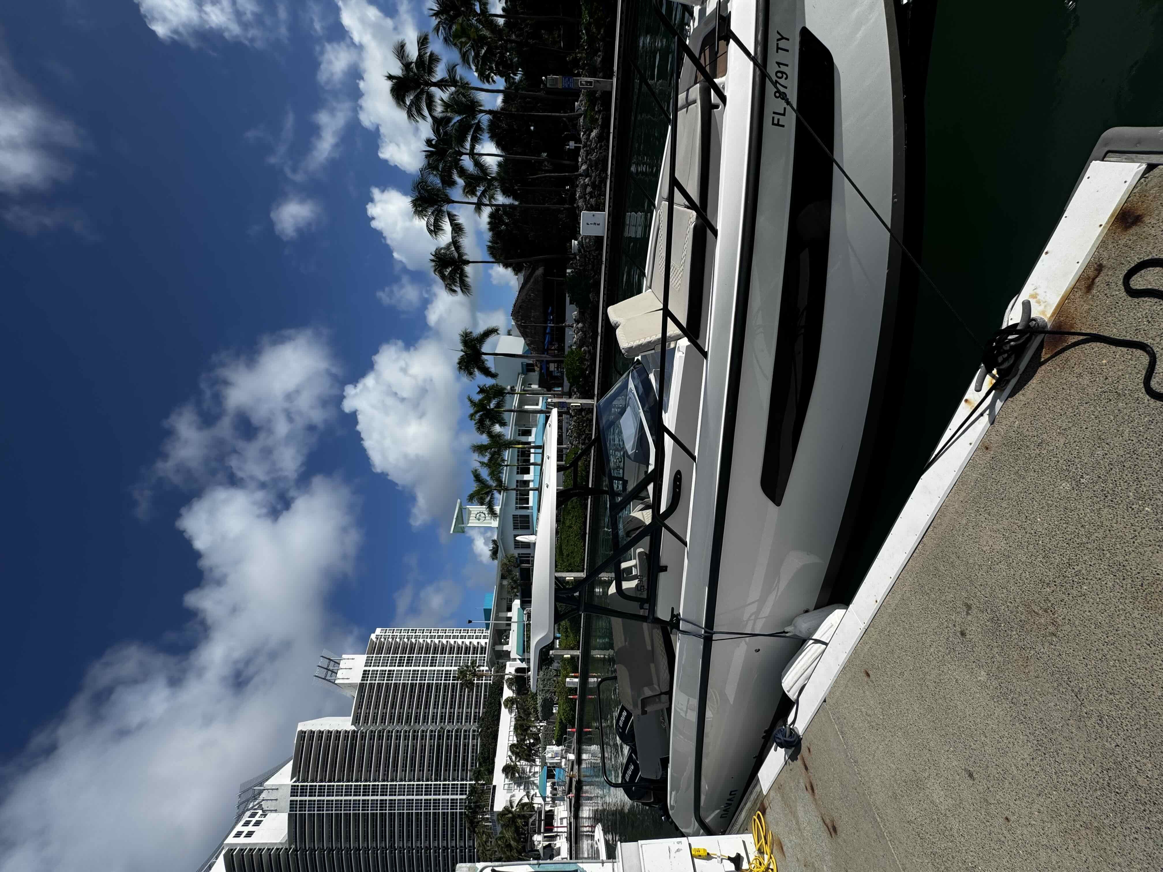 MIAMI BEACH IX (Elite 30' NAVAN Twin 225hp Center Console - Cruising Only)