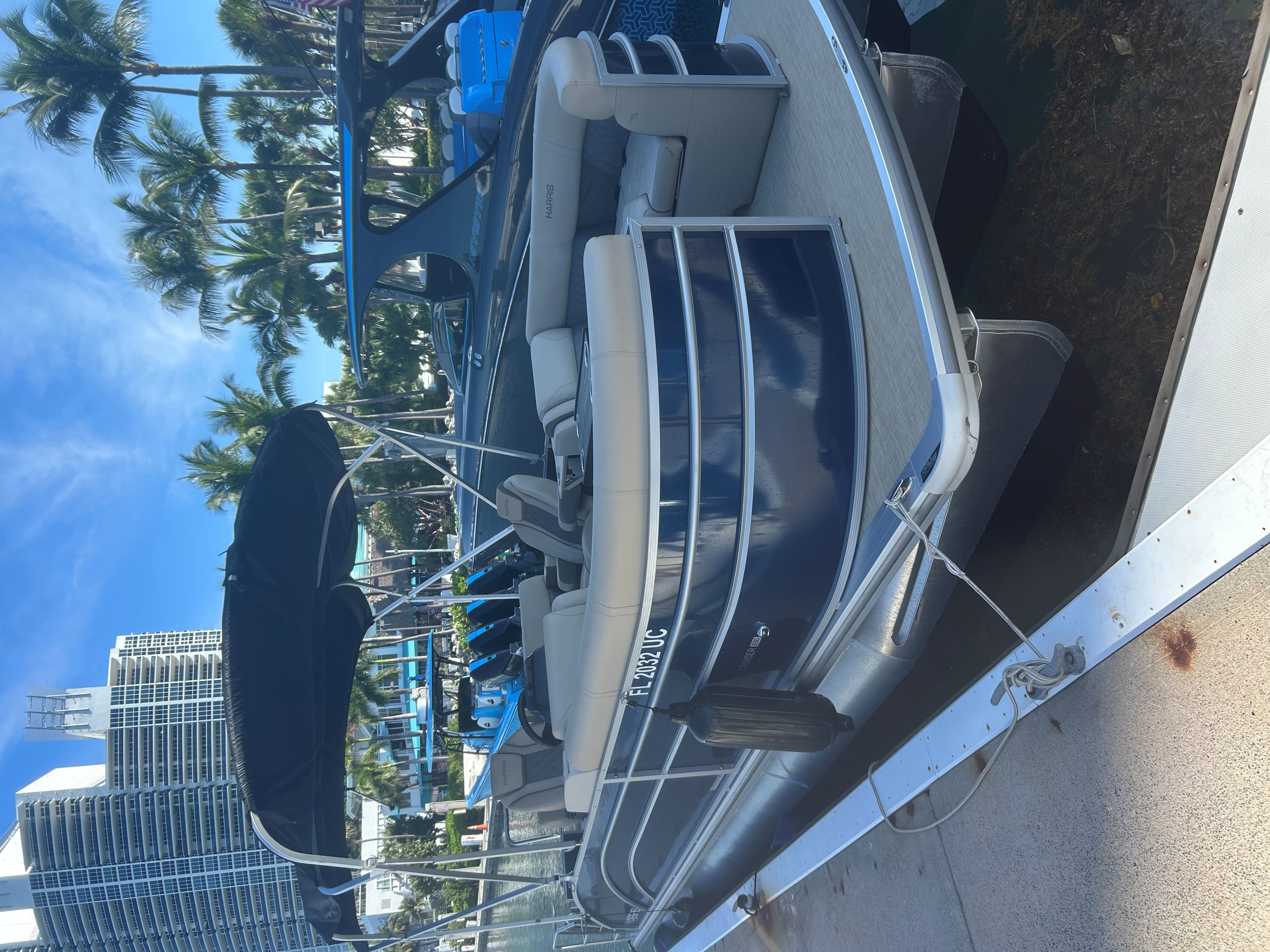 OVERBOARD (23' Harris HCX23 Tritoon 150 HP - Fishing or Cruising)